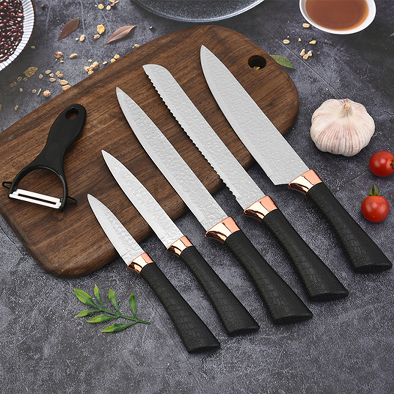 Six piece set of horseshoe handle ice hammer pattern knives